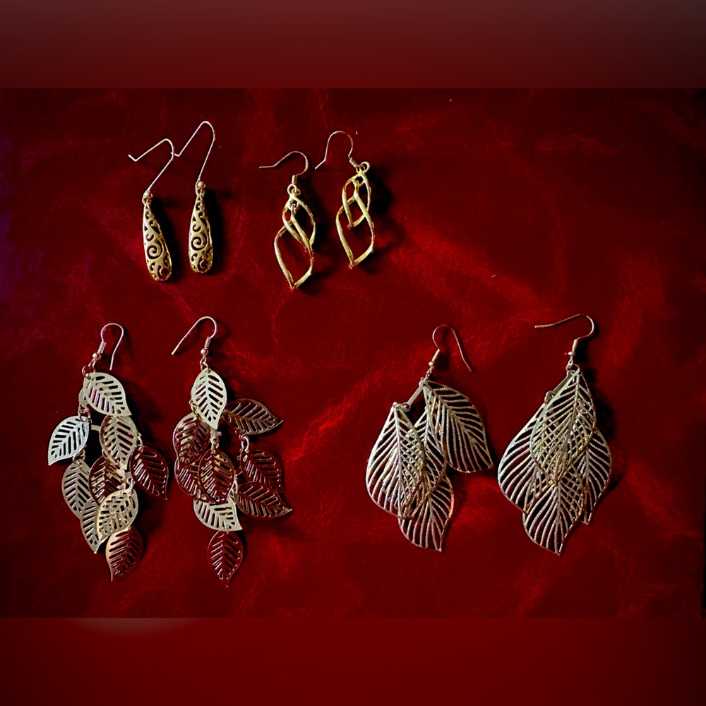 Set of gold dangle earrings
